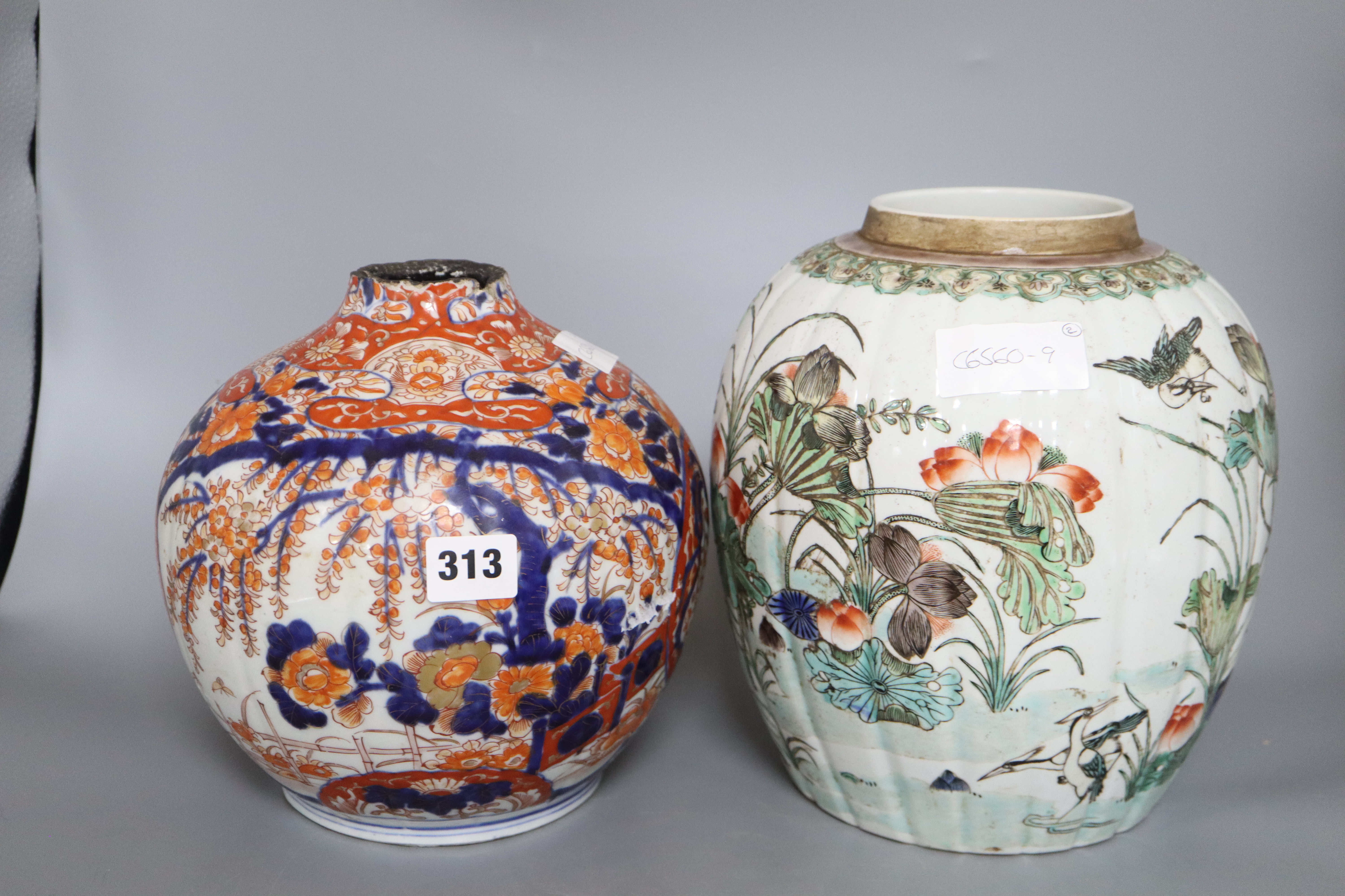 A Chinese famille verte vase and an Imari vase, tallest 24cm (a.f.)